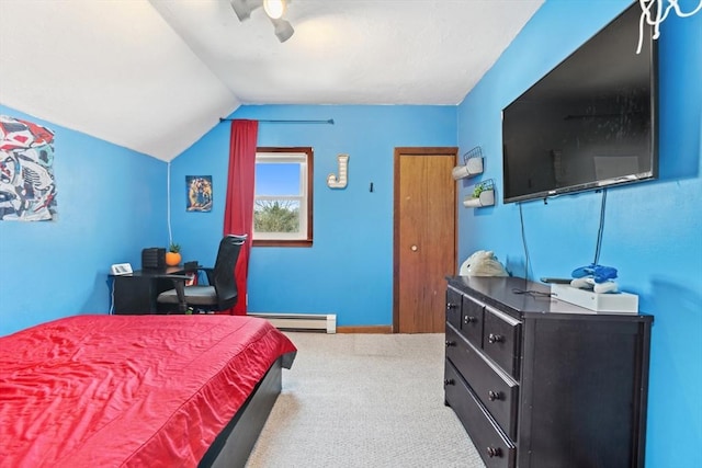 carpeted bedroom with baseboard heating, ceiling fan, and lofted ceiling