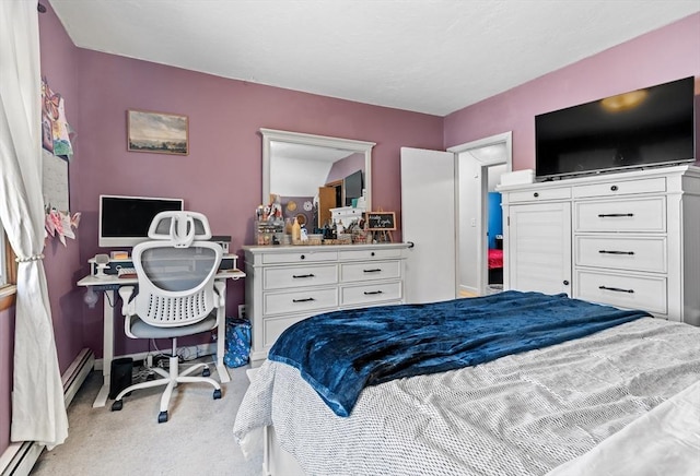 bedroom with light carpet and a baseboard radiator