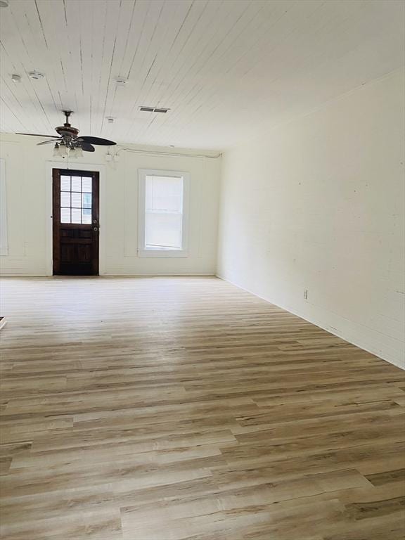 entrance foyer with ceiling fan, light hardwood / wood-style flooring, and wood ceiling