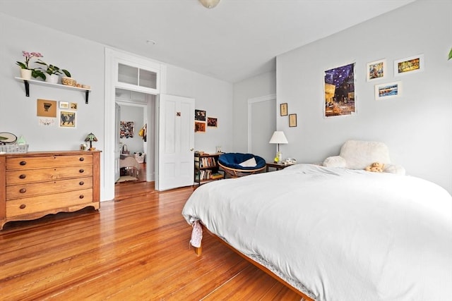 bedroom with light wood-style flooring