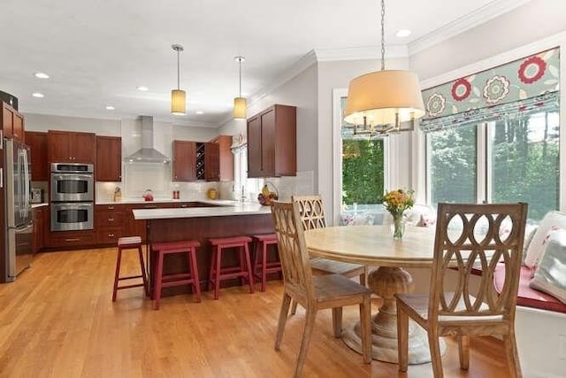 51 Fox Run Rd, Sudbury, MA 01776 - dining area featuring crown molding, light wood-style floors, and recessed lighting
