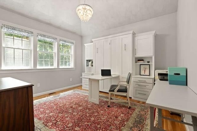 51 Fox Run Rd, Sudbury, MA 01776 - office with a chandelier and light wood finished floors