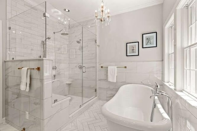 51 Fox Run Rd, Sudbury, MA 01776 - full bath with a freestanding bath, a shower stall, ornamental molding, a chandelier, and tile walls
