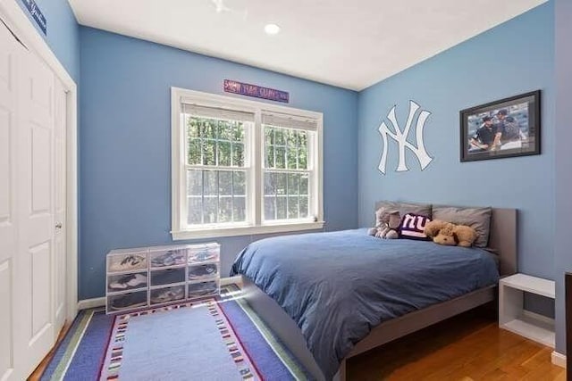 51 Fox Run Rd, Sudbury, MA 01776 - bedroom with wood finished floors and recessed lighting