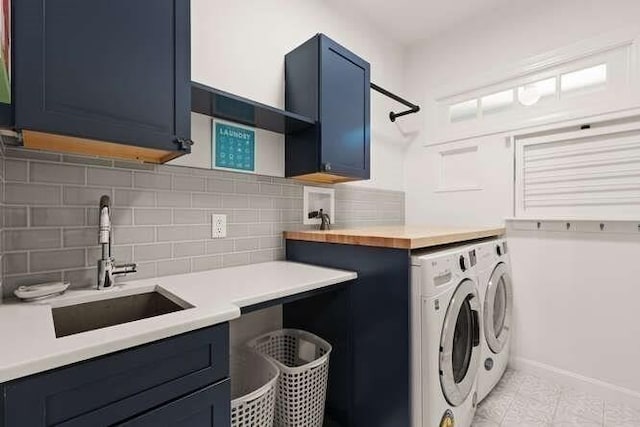 51 Fox Run Rd, Sudbury, MA 01776 - washroom with cabinet space, separate washer and dryer, and light tile patterned flooring