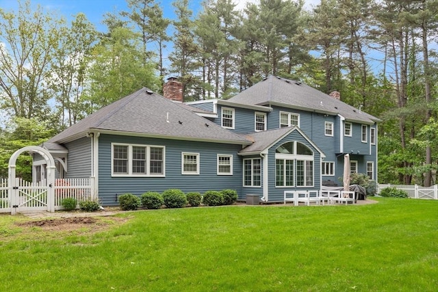 51 Fox Run Rd, Sudbury, MA 01776 - back of house featuring a chimney, a gate, and a shingled roof