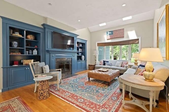 51 Fox Run Rd, Sudbury, MA 01776 - living room with light wood-type flooring, a fireplace with flush hearth, and recessed lighting