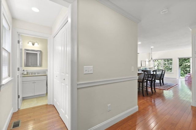 21 Pine St Unit 1A, Falmouth, MA 02556 - corridor with light wood finished floors and recessed lighting