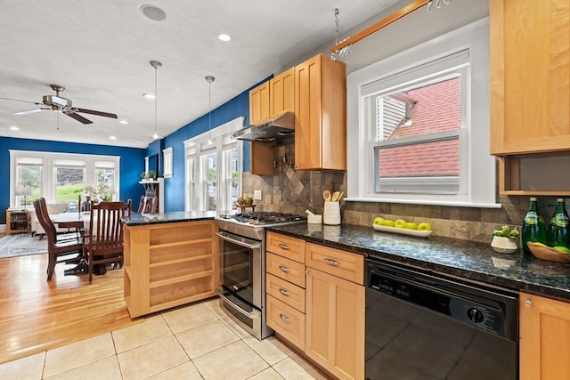 338 Forest St, Arlington, MA 02474 - kitchen featuring dishwasher, stainless steel gas stove, under cabinet range hood, a peninsula, and light tile patterned flooring
