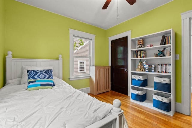 338 Forest St, Arlington, MA 02474 - bedroom featuring wood finished floors and ceiling fan