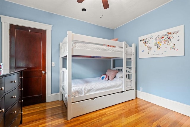 338 Forest St, Arlington, MA 02474 - bedroom featuring wood finished floors and a ceiling fan