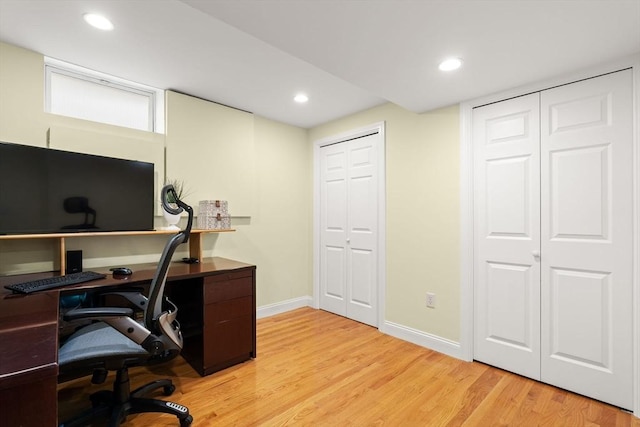 338 Forest St, Arlington, MA 02474 - home office with light wood-style flooring and recessed lighting