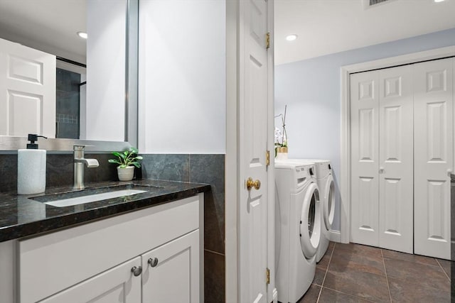 338 Forest St, Arlington, MA 02474 - laundry room featuring separate washer and dryer and recessed lighting