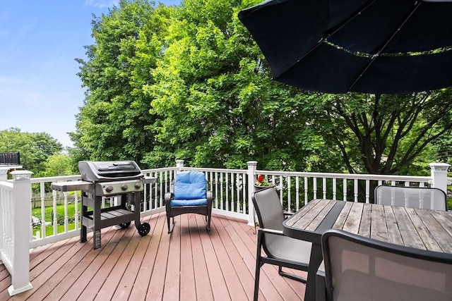 338 Forest St, Arlington, MA 02474 - wooden deck with grilling area and outdoor dining area