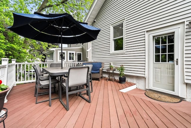 338 Forest St, Arlington, MA 02474 - wooden deck with outdoor dining space