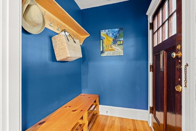 338 Forest St, Arlington, MA 02474 - mudroom featuring baseboards and wood finished floors