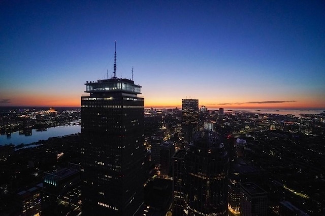 property's view of city featuring a water view
