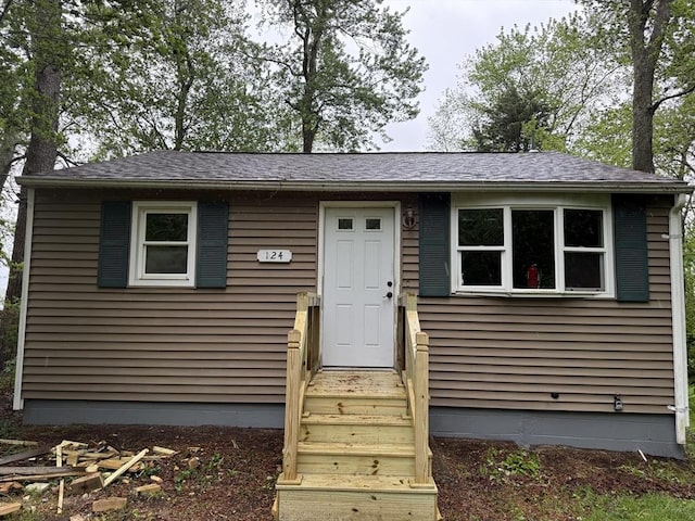 124 Bixby Dr, Bridgewater, MA 02333 - view of front of home featuring roof with shingles