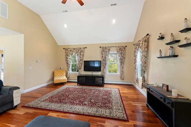 55 Arbor Rd, Uxbridge, MA 01569 - living area with baseboard heating, high vaulted ceiling, wood finished floors, a ceiling fan, and baseboards