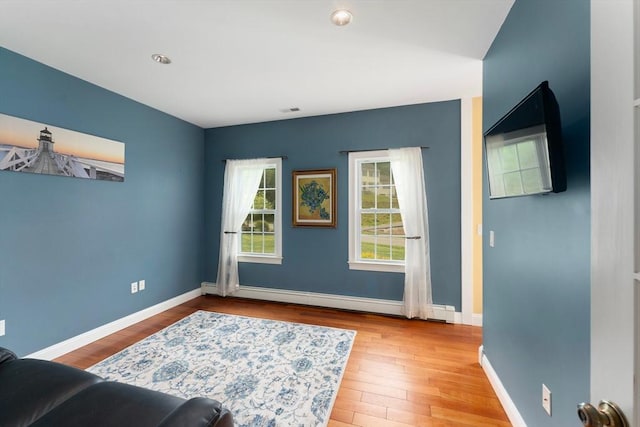 55 Arbor Rd, Uxbridge, MA 01569 - interior space with a baseboard radiator, wood finished floors, and baseboards