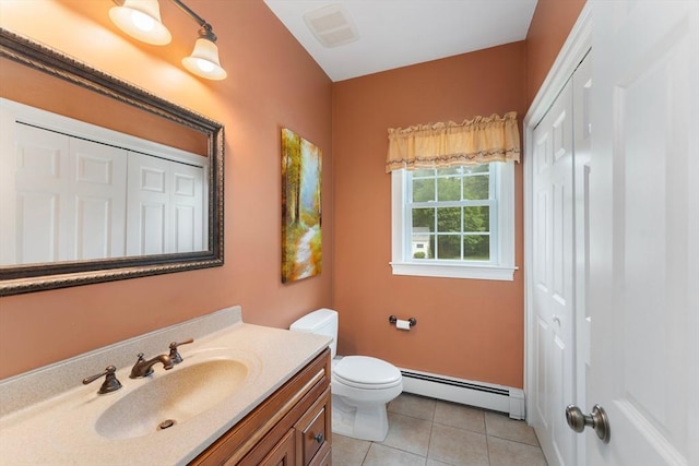55 Arbor Rd, Uxbridge, MA 01569 - bathroom featuring a baseboard heating unit, a closet, and vanity