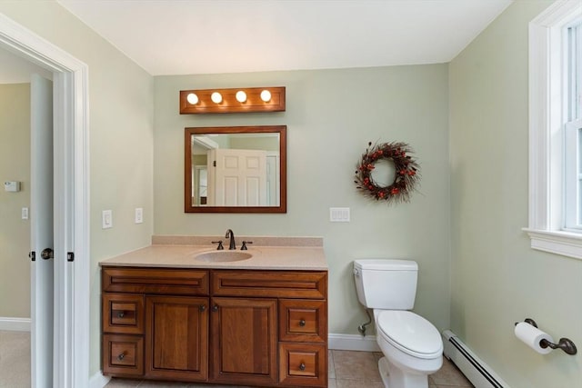 55 Arbor Rd, Uxbridge, MA 01569 - bathroom featuring a baseboard heating unit, baseboards, toilet, vanity, and tile patterned floors