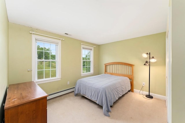 55 Arbor Rd, Uxbridge, MA 01569 - bedroom featuring a baseboard heating unit, light colored carpet, and baseboards