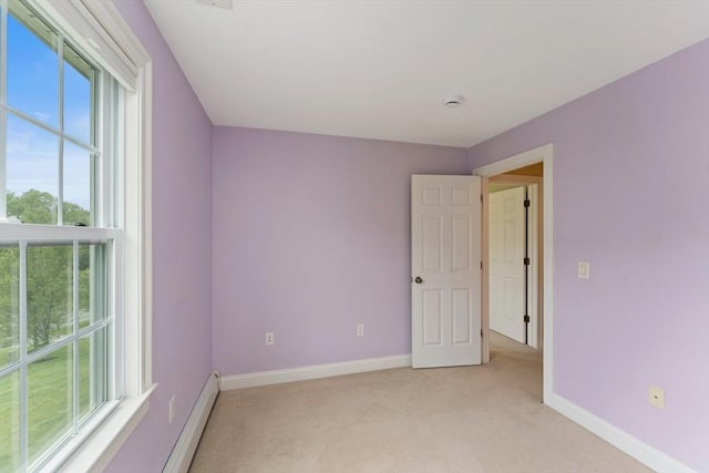 55 Arbor Rd, Uxbridge, MA 01569 - empty room with light colored carpet, baseboards, and a smoke detector