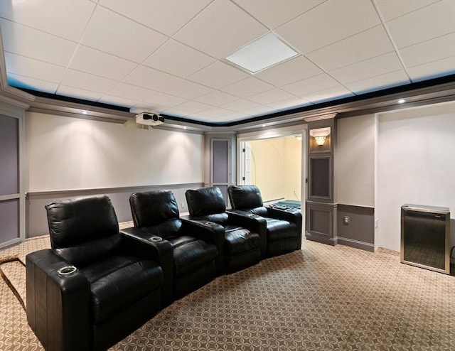 55 Arbor Rd, Uxbridge, MA 01569 - carpeted home theater room featuring ornamental molding, wainscoting, a drop ceiling, and baseboards