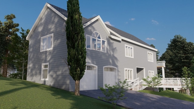 view of home's exterior with a yard and a garage