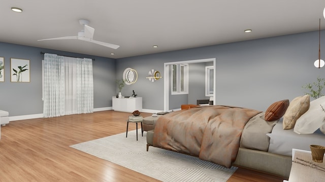 bedroom featuring ceiling fan and wood-type flooring