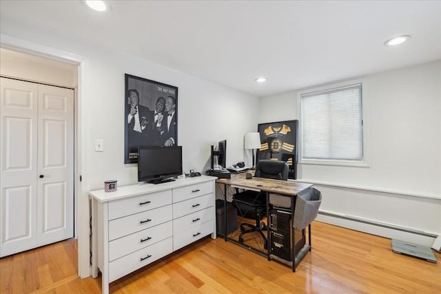 office featuring recessed lighting, light wood finished floors, and a baseboard radiator