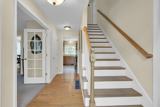 42 Mcgregory Rd, Sturbridge, MA 01566 - stairway with wood finished floors and baseboards