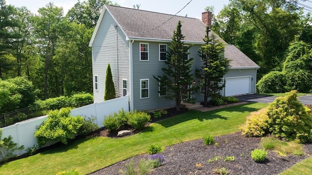 42 Mcgregory Rd, Sturbridge, MA 01566 - colonial house featuring a chimney, a garage, and roof with shingles