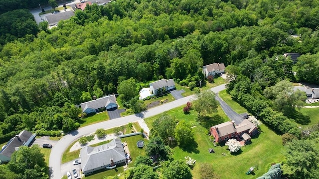 42 Mcgregory Rd, Sturbridge, MA 01566 - aerial view of property and surrounding area featuring a heavily wooded area and nearby suburban area