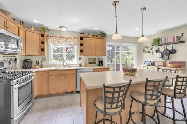 42 Mcgregory Rd, Sturbridge, MA 01566 - kitchen with stainless steel appliances, open shelves, light countertops, healthy amount of natural light, and recessed lighting