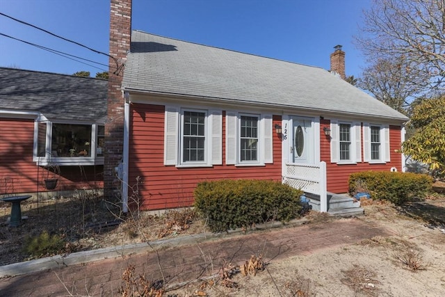 125 Wamsutta Rd, Eastham, MA 02642 - cape cod house with a chimney
