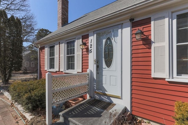 125 Wamsutta Rd, Eastham, MA 02642 - view of exterior entry featuring a chimney