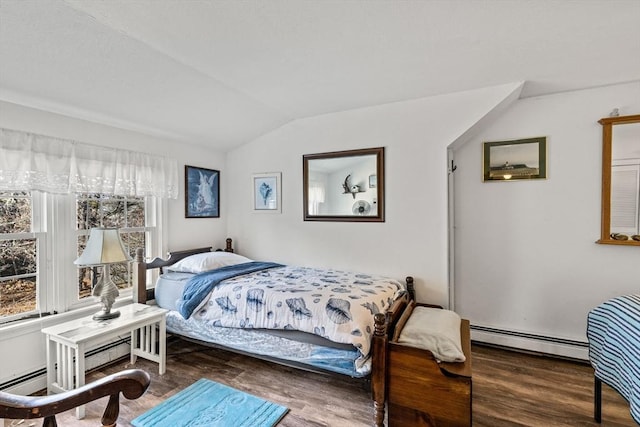 125 Wamsutta Rd, Eastham, MA 02642 - bedroom with baseboard heating, vaulted ceiling, and wood finished floors