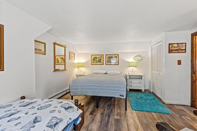 125 Wamsutta Rd, Eastham, MA 02642 - bedroom featuring a baseboard radiator, wood finished floors, and a closet