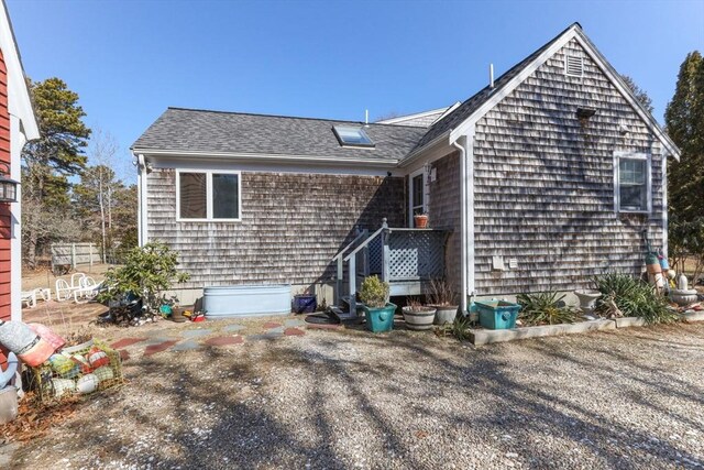 125 Wamsutta Rd, Eastham, MA 02642 - view of front of house featuring a shingled roof