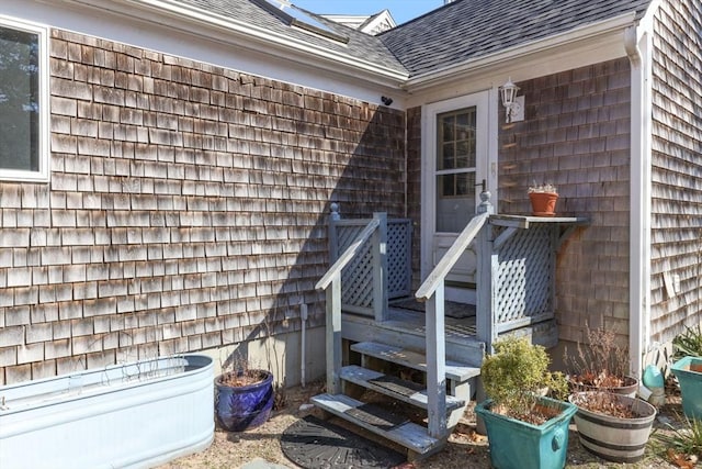 125 Wamsutta Rd, Eastham, MA 02642 - property entrance featuring a shingled roof
