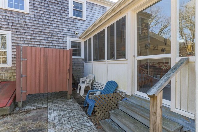 125 Wamsutta Rd, Eastham, MA 02642 - view of patio / terrace with entry steps and a sunroom