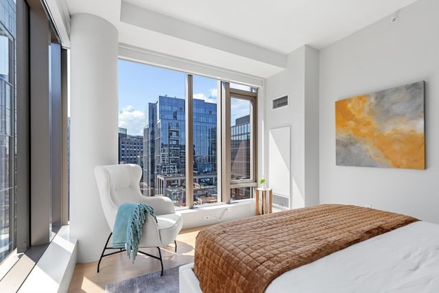 bedroom with light hardwood / wood-style flooring