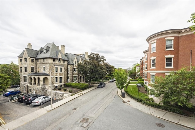 34 Garrison Rd Unit 4, Brookline, MA 02445 - view of asphalt street featuring curbs and sidewalks