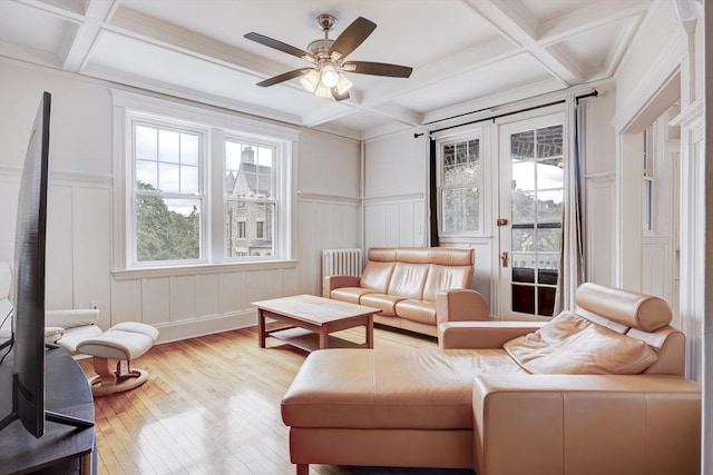 34 Garrison Rd Unit 4, Brookline, MA 02445 - living room with coffered ceiling, wood-type flooring, beam ceiling, a decorative wall, and ceiling fan