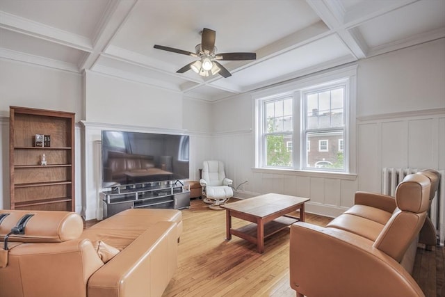 34 Garrison Rd Unit 4, Brookline, MA 02445 - living area featuring coffered ceiling, wood-type flooring, beam ceiling, ceiling fan, and a wainscoted wall