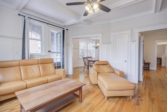 34 Garrison Rd Unit 4, Brookline, MA 02445 - living area featuring a decorative wall, coffered ceiling, a ceiling fan, beam ceiling, and light wood-style floors