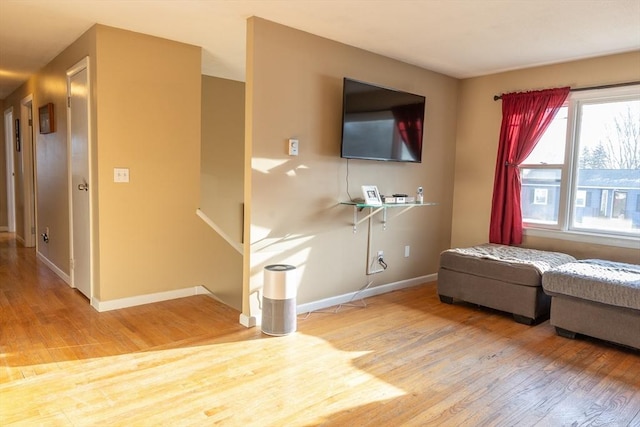 unfurnished living room featuring hardwood / wood-style floors