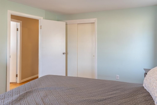 unfurnished bedroom with a closet